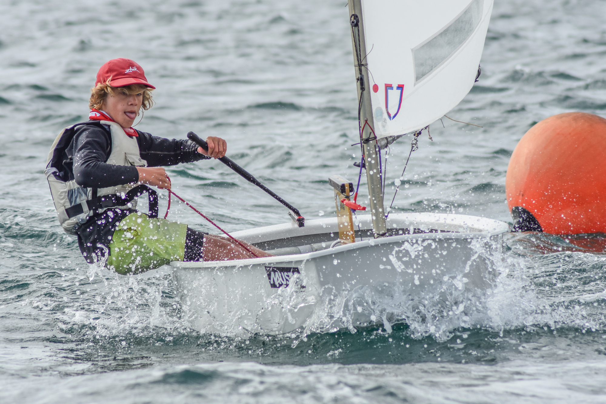 Fluky conditions kick off racing at Musto SA Optimist States