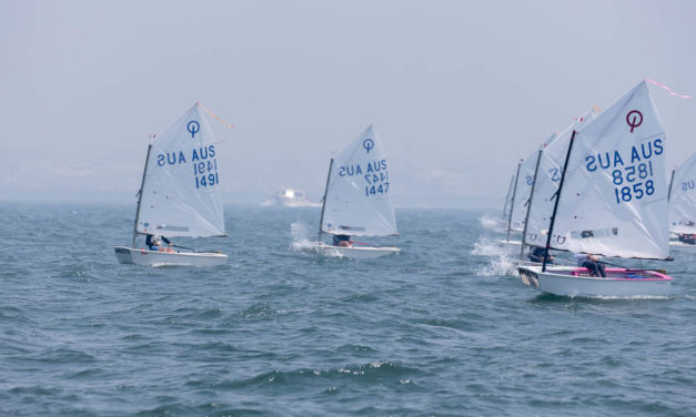 Light and fickle conditions in invitational race for 2020 Musto Optimist Australian Championships